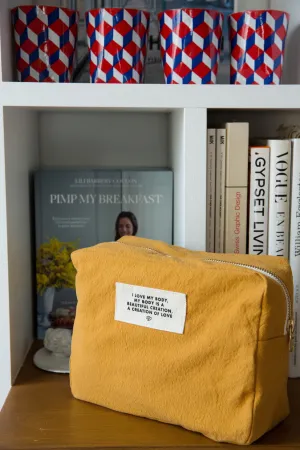 The pouch in collaboration with Lili Barbery - Recycled cotton yellow amber